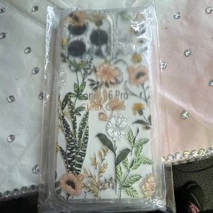 Funda transparente iPhone 16 Pro con diseño de flores. Nuevo - Imagen 1 de 2