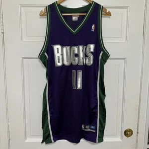 Maglia vintage Reebok autentica Milwaukee Bucks TJ Ford 11 uomo 48 cucita - Foto 1 di 23