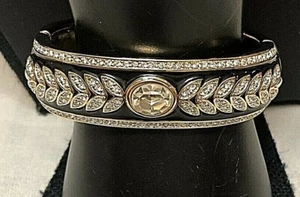 Brazalete con bisagras Swarovski de 7" tono dorado, cristal y esmalte negro 'hoja de laurel' - Imagen 1 de 11