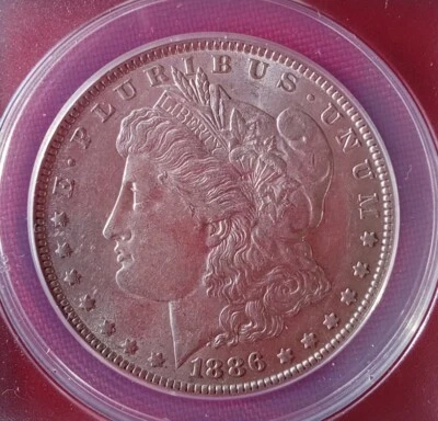1886 P  Morgan Silver Dollar ANACS Graded AU 55 . - Image 1 of 4