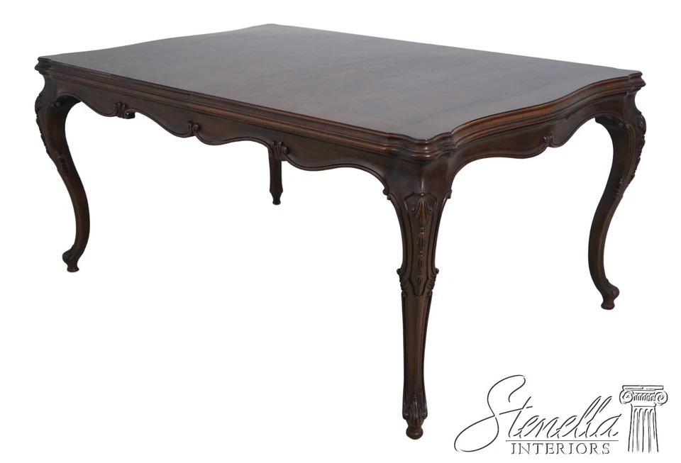 L70753: Mesa de comedor tallada en nogal KARGES Luis XV Foto 1 de 1