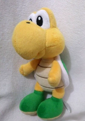 Videogames de bicho de pelúcia amarelo e verde Super Mario Bros Yoshi 8" - Imagem 1 de 4