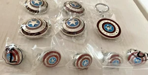 LOT of CAPTAIN AMERICA 5 SPINNING SHIELDS KEYCHAINS & 5 RINGS sizes 7-12 - Picture 1 of 8