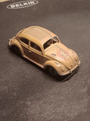HERBIE THE LOVE BUG CHATARRA #1 1/64 VW ESCARABAJO con PAQUETE PROTECTOR Foto 1 de 2