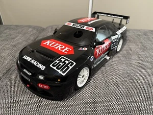 Tamiya TGX Mk1 Vintage Nitro Kure Skyline GTR - Picture 1 of 9