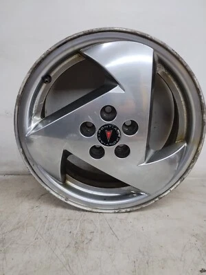 2003-2005 PONTIAC SUNFIRE 16X6  3 DIRECTIONAL SPOKE SILVER FINISH ALUMINUM WHEEL - Image 1 of 4