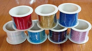 Lot of 7 NOMIS Yarn CO Glitter Sparkle Thread 100 YD Each Red Gold Silver Purple - Picture 1 of 9