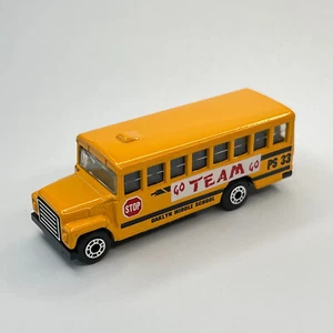 Matchbox School Bus Oaklym Middle School Orange Body Mint - Picture 1 of 6