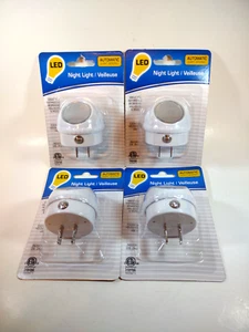 4 Pack Plug in LED Night Light Sensor Activated Dusk to Dawn Rotating Lamp - Picture 1 of 6