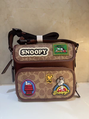 COACH x PEANUTS 2025 Sullivan Flap Crossbody Bag Signature Canvas Patch CBI41 - Image 1 of 4