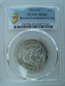 1964 50C Reverse Lamination 11.12g PCGS MS63 SN. 334 - Picture 1 of 2