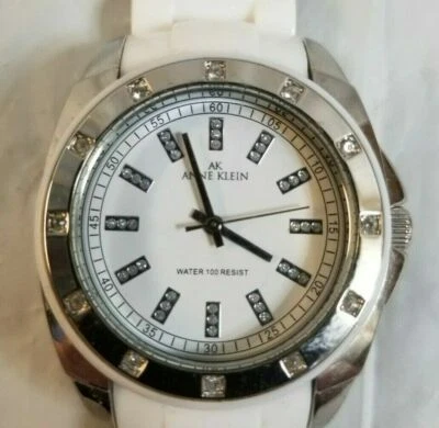 ANNE KLEIN V121E Lady's Watch Rstones White Band RUNS but NEEDS BATTERY - Image 1 of 4