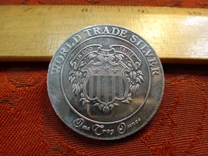 American Argent Mint Ltd. World Trade Unit 1 Oz .999 Silver Round - No Reserve - Picture 1 of 3