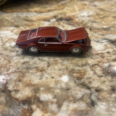 Johnny Lightning Classic Gold 1966 Oldsmobile Toronado Copper 1:64 diecast car - Image 1 of 4