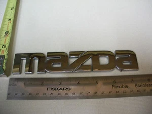 MAZDA SCRIPT EMBLEM SYMBOL USED BAGDE CHROME OEM ORIGINAL   - Picture 1 of 1