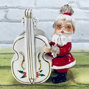 Vintage Ucagco 5" Keramik Weihnachtsmann spielt Cello Übertopf mit Aufkleber - Bild 1 von 15