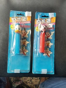 2 Hungary Disney Characters PEZ Dispensers In Open Packages Donald Mickey - Imagen 1 de 3