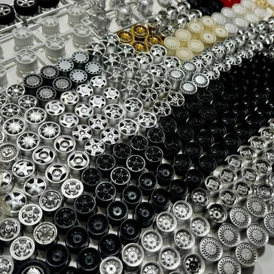 Modellino auto scala 1/24 ruote set di 100 ruote in plastica per auto... - Immagine 1 di 2