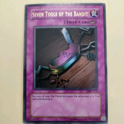 Yu-Gi-Oh ULTRA RARO HOLO SIETE HERRAMIENTAS DEL BANDIDO MRD-129 LP Foto 1 de 3