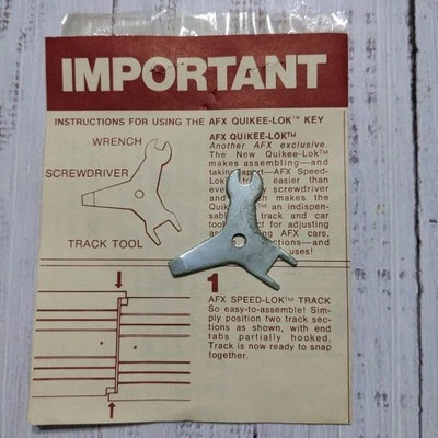 Herramienta de pista Aurora años 70 ranura coche pista de carreras vintage Foto 1 de 4