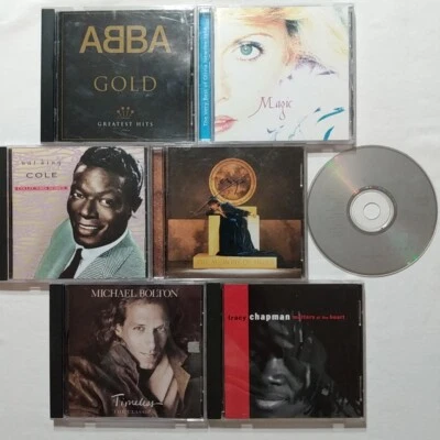 7 CD Pop Abba Gold Olivia Newton John Magic Nat King Cole Enya Bolton Chapman - Image 1 of 4