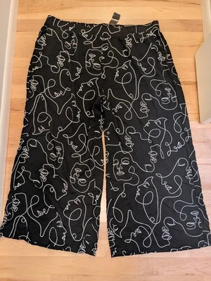 Pantalones 5T Torrid Black Faces Challis Bolsillos Pierna Ancha 28 Alto 50x31 Foto 1 de 4