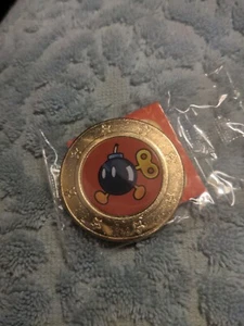 Moneta Wonder Ball Super Mario Bob-omb Bomb mai aperta - Nintendo - Rara - 2020 - Foto 1 di 3