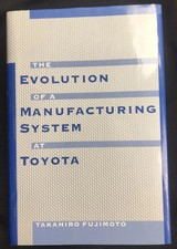 The Evolution of a Manufacturing System at Toyota by Fujimoto, Takahiro , hardco