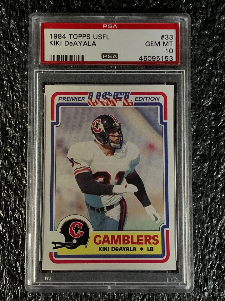 1984 Topps Football #33 Kiki DeAyala PSA 10 - Image 1 of 2