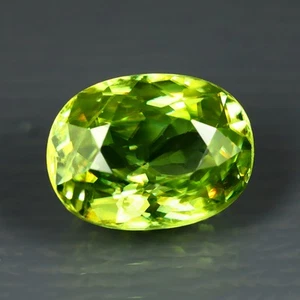 Pierre précieuse naturelle sphène verte Pakistan coupe ovale éblouissante 1,89 ct - Photo 1/2