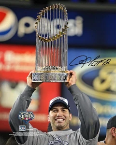 Andy Pettitte New York Yankees Signed 8" x 10" 2009 World Series Trophy Photo - Picture 1 of 1