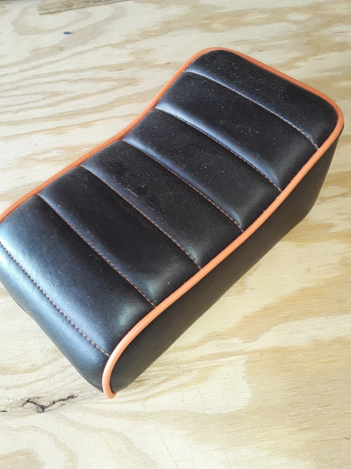 12 x 7 mini-bike seat Black w/ orange trim - Image 1 of 1