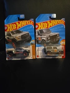 2025 Hot Wheels M Case Zamac Land Rover Defender 90 & '17 Ford F-150 Raptor 9+10 - Picture 1 of 3