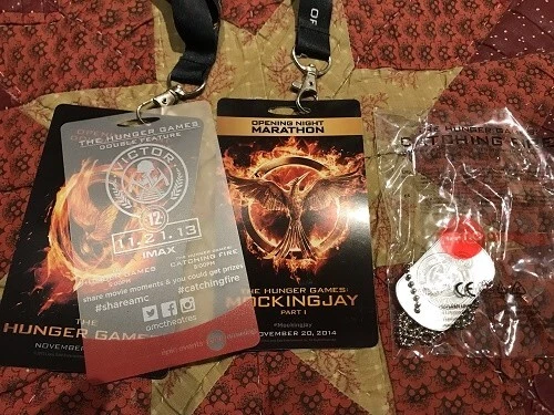 HG Catching Fire Dbl Ftr and Mockingjay Marathon Lanyards, plus Victors medal... - Image 1 of 1