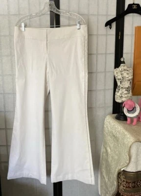 Брюки Bebe белые средней посадки широкие с поясом и подкладкой с 10 вырезом сбоку «полоски» - Изображение 1 из 4