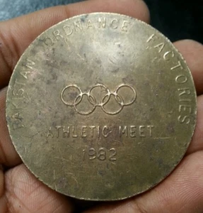 1982 PAKISTAN ORDNANCE FACTORIES ATHLETIC MEET HOP STEP & JUMP SPORTS MEDAL 51MM - Picture 1 of 2