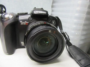 CANON POWERSHOT SX10 IS 10MP DIGITAL SLR CAMERA 5-100MM LENS - WORKS - Picture 1 of 3