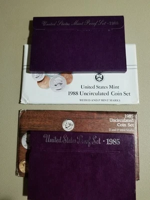 US 1985 & 1988 Clad Proof & Mint sets in original packaging - Image 1 of 4