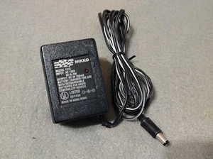 Fuente de alimentación adaptador CA Nikko modelo 1212 9V 200mA - Imagen 1 de 3