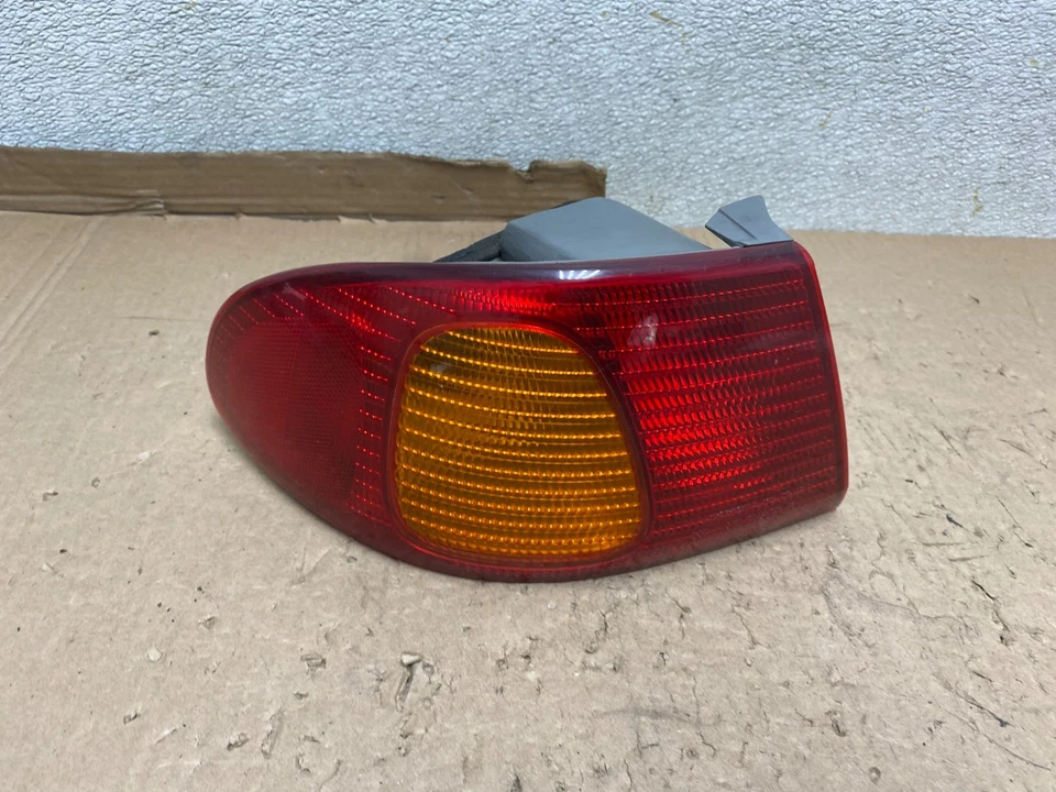 1998 1999 2000 Toyota Corolla левый водитель левая сторона задний фонарь U9619 DW - Изображение 1 из 4