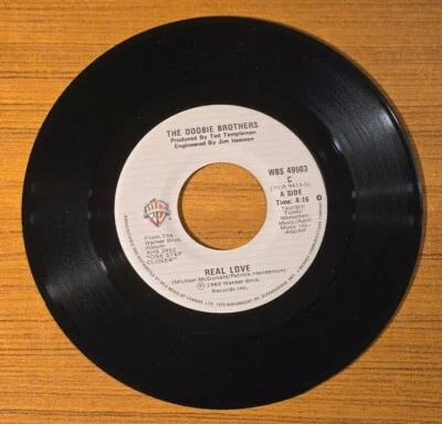 DOOBIE BROTHERS - REAL LOVE. 45 RPM 7" VINYL RECORD. 1980 RARE CANADIAN VARIANT. - Image 1 of 4