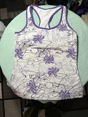 Woman’s Medium Danskin Purple Flowered Double Layered Yoga Top - Image 1 of 4
