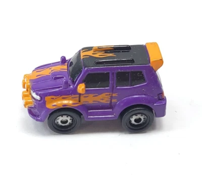 Small Hasbro Micro Machine SUV in Purple & Orange Flames  with Rally Lights - Image 1 of 4