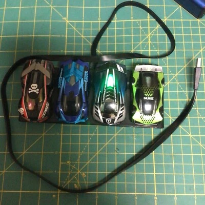 Anki Overdrive Lot Of 4 Cars w/Charger - Image 1 of 4