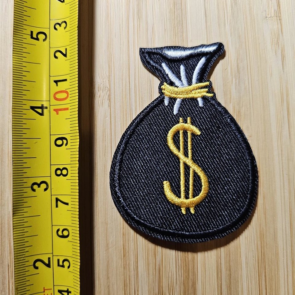 P145 BOLSA PARA LETREROS DE DINERO EFECTIVO DENIRO MOULAH BILLETES HACER MONEDAS BANCARIAS PARCHE Foto 1 de 1