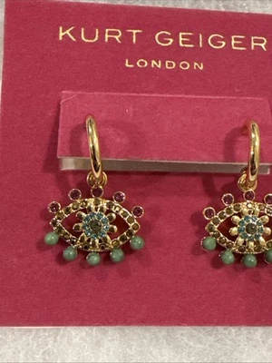Pendientes colgantes Kurt Geiger London Boho Mal de Ojo Dije Huggie Aro $78.00 Nuevos Foto 1 de 3