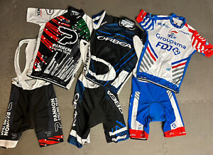 Team Cycling Kits (3) Jersey and bib Short Set. Size XL but runs very small.
