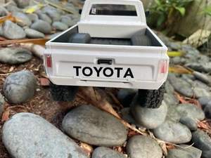 2 Black Vinyl Toyota Logo Decals- WPL C24 Upgrade - for 1/16 Scale Model Trucks - Picture 1 of 6