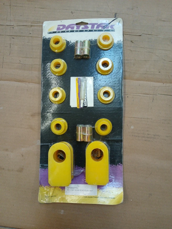 Juego de bujes de barra estabilizadora trasera de poliuretano de 1 1/8" NOS Daystar KF05027YL Ford Foto 1 de 3