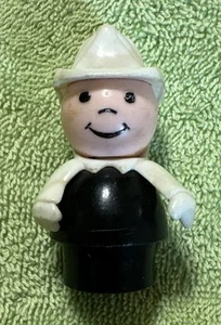 Vtg Plastic Fisher Price Firefighter Little People White Hat/ Arms Black Body - Picture 1 of 8